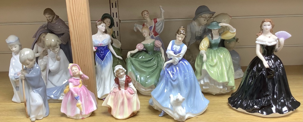 A group of ceramic figurines, various